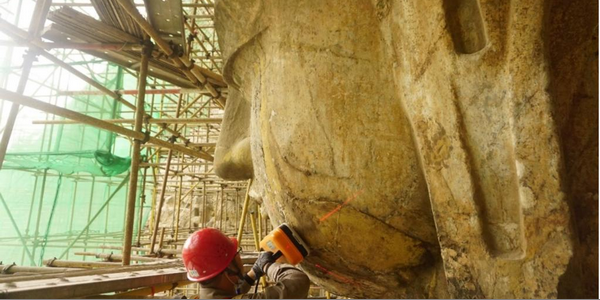 龙门石窟最新考古发现，揭开卢舍那大佛千年前“风华”